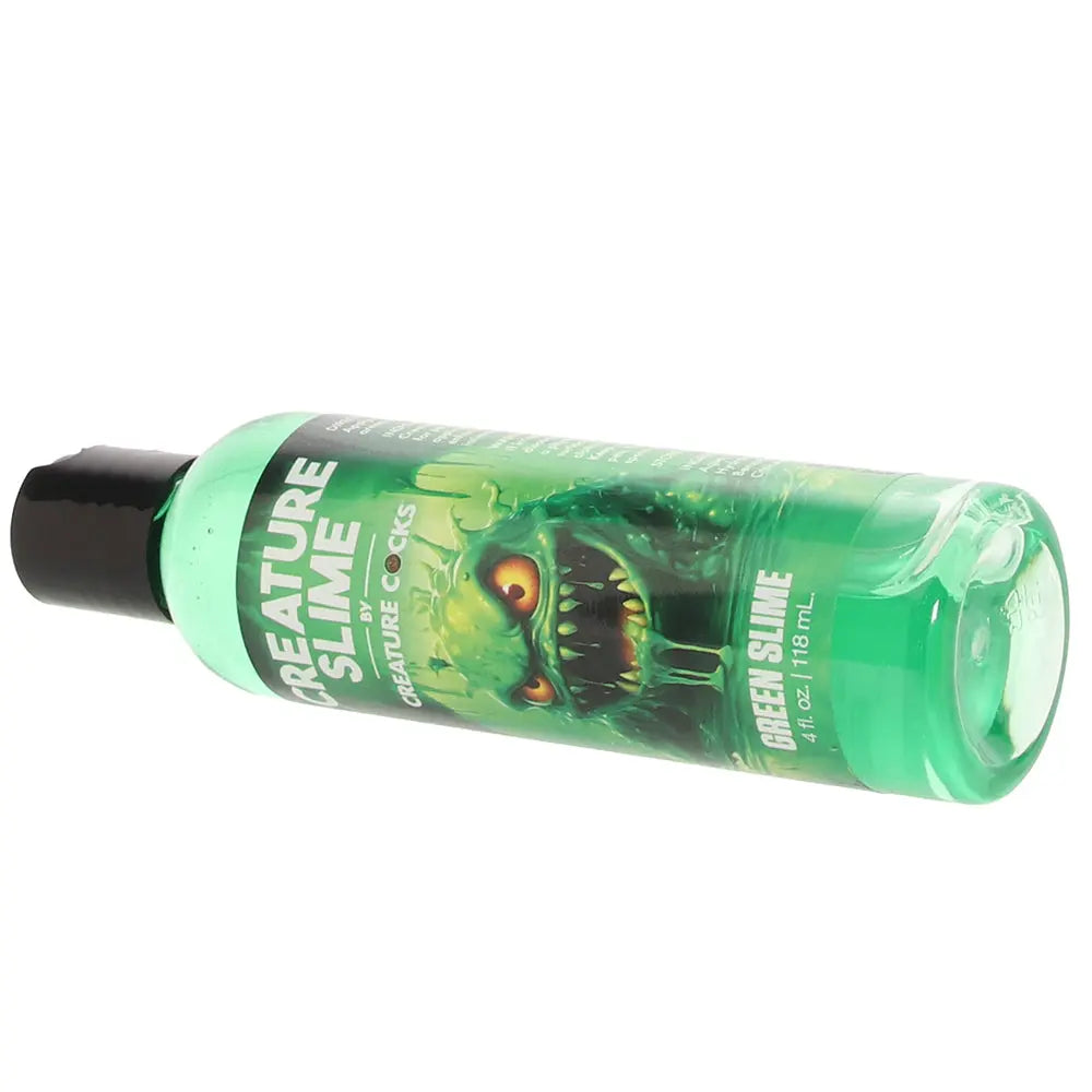 Creature Slime Water-Based Green Slime Lube in 4oz/118ml Calgary Same-Day Delivery Creature Cocks laying position