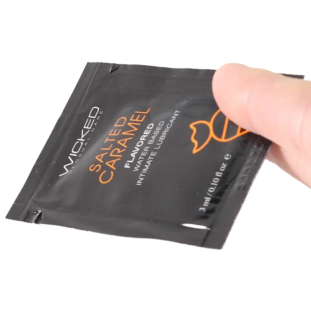 sex toys Aqua Flavored Lube Salted Caramel on hand position Sex Toys Calgary Same-Day Delivery